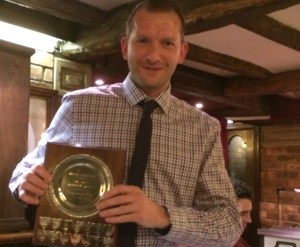Rob Hewlitt with the prestigious Fielder of the Year trophy.